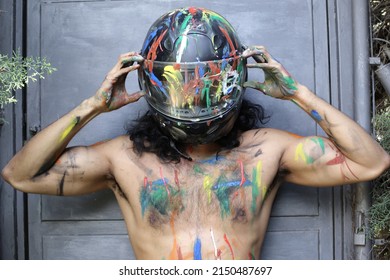 Muscular Unrecognizable Motorcycle Rider With Artsy Body Paint