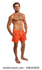 Muscular Young Man In Swimwear Standing On White Background