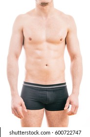 Muscular Young Man Wearing Boxer Briefs Isolated On White Background.