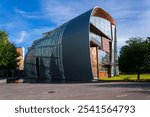 Museum of contemporary art Kiasma exterior, part of Finnish National Gallery, Helsinki, Finland, sunny summer day