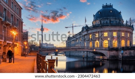 Museum Island on Spree river and TV tower in the background at sunrise, Berlin, Germany