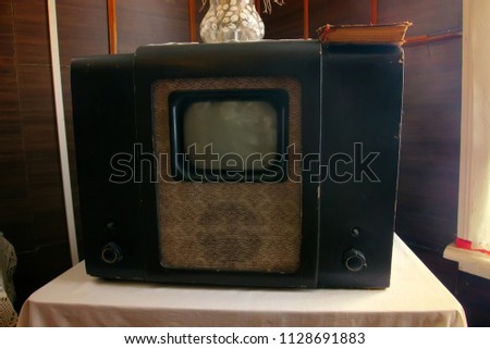 Museum of old things. Household items 19th and 20th century - lamp TV with cathode ray tube and micro-screen