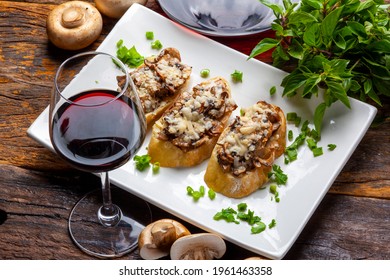 Mushroom Bruschetta And Grated Parmesan And Red Wine