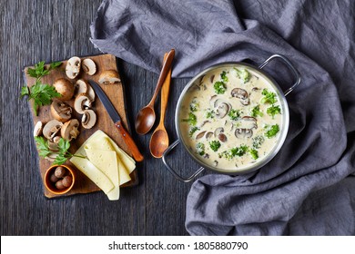 Mushroom Cheese Broccoli Soup In A Pot With Ingredients At The Background, Horizontal View From Above, Close-up, Flat Lay