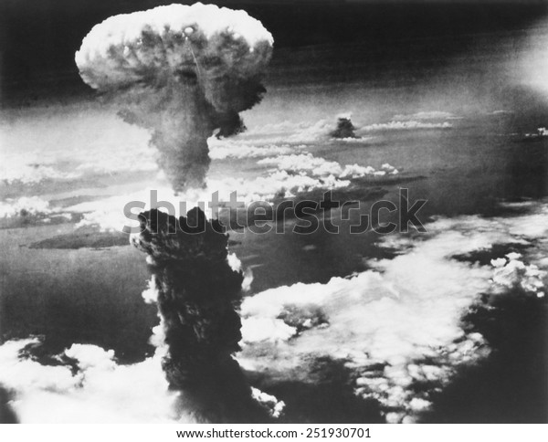 Mushroom Cloud of Atom Bomb exploded\
over Nagasaki, Japan, on August 9, 1945. World War\
2.