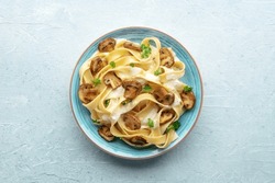 Mushroom Pasta, Pappardelle With Cream Sauce And Parsley, Overhead Flat Lay Shot On A Stone Background