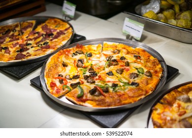 Mushroom Pizza Served At A Buffet