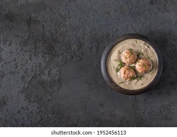 Mushroom Soup Puree With Meatballs, Dill And Croutons In A Wooden Bowl On A Dark Background In Rustic Style Top View Copy Space