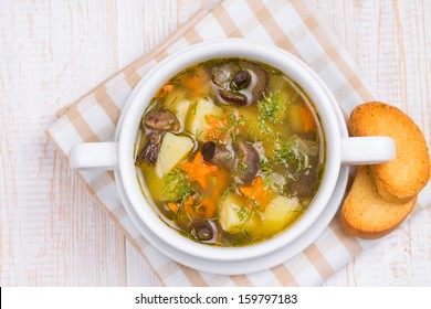 Mushroom Soup In A White Ceramic Tureen