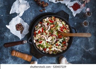 Mushrooms Bell Peppers Stew In Frying Pan. Overhead Of Vegetables Stew Cast Iron Pan. 