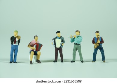 music band playing music, isolated on light background - Shutterstock ID 2231663509