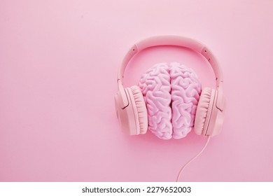 Music brain and musical therapy. Human brain with headphones - Shutterstock ID 2279652003