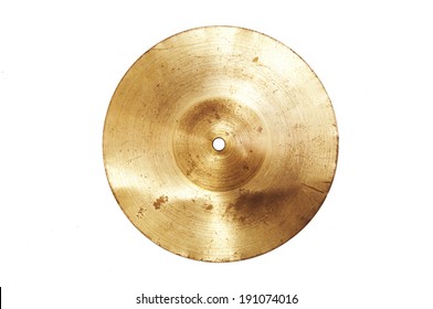 Music conceptual image. Close up of an old cymbal on isolated background.