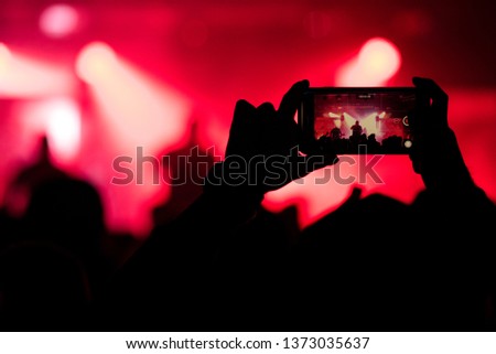 Music concert, silhouette of girls hands raised up, enjoying in the club, luxury night performance, active lifestyle, having fun, background.