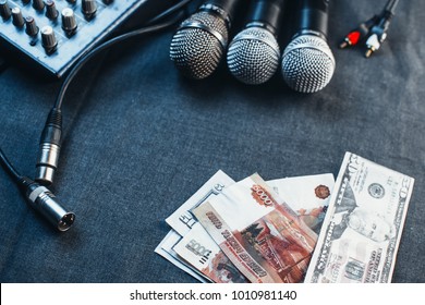 Music equipment, microphones, console and the money to pay the fee