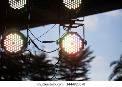 Music Festival Stage Lighting Outdoors With Palm Trees In The Background