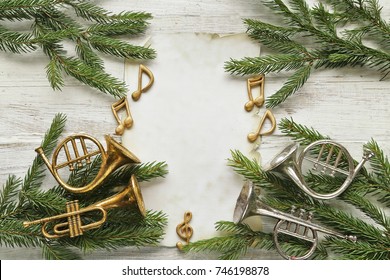 Music Instruments, Notes   On Christmas Tree Branch  With Paper On Wooden 