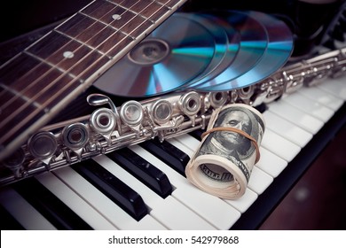 Music instruments.Music and money concept.