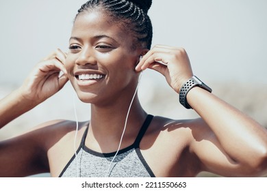 Music, Motivation And Black Woman Training For Fitness With Audio Podcast In The City Of Australia. Face Of An African Athlete Runner Running For Cardio Exercise While Listening To The Radio