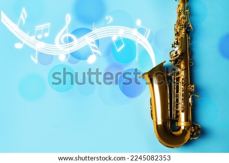 Music notes and other musical symbols flowing from saxophone on light blue background