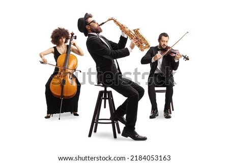 Music orchestra performing with a cello, saxophone and a violin isolated on white background
