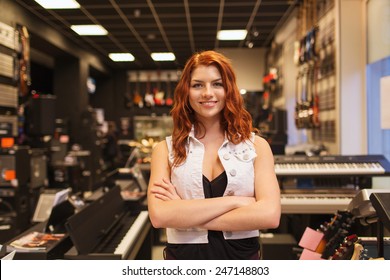 Music, Sale, People, Musical Instruments And Entertainment Concept - Smiling Female Assistant Or Customer At Music Store