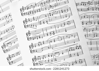 Music sheets. Melodies written with different musical symbols as background, closeup - Shutterstock ID 2281241273