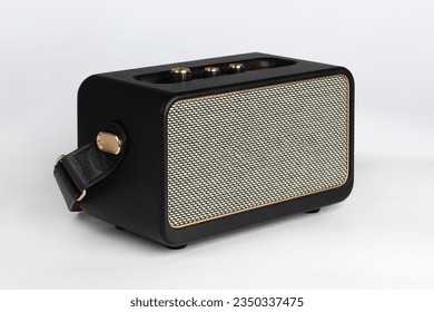 Music speaker. Gold-black stereo wireless speaker
