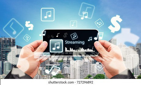 Music stream icon from Smart phone on modern city background for business music concept