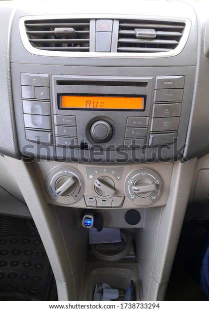 Music\
system in a car / dashboard of a car and AC\
buttons