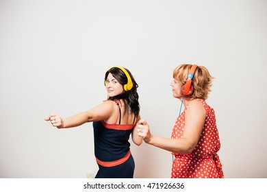 music and technology concept two girls - Shutterstock ID 471926636