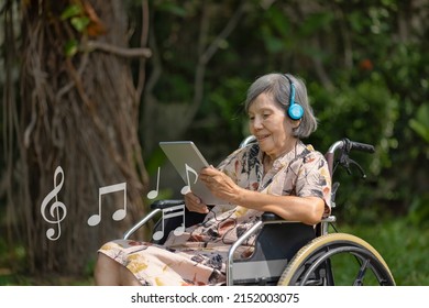 Music Therapy In Dementia Treatment On Elderly Woman.