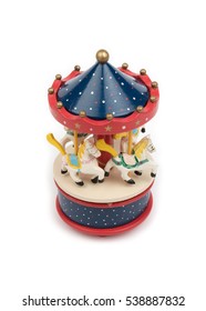 Musical Carousel With Horses. Blue, Red, White Merry Go Round. Toy. Vintage Carousel, Made From Solid Wood. Winter,Christmas, New Year Decoration. Isolated On White Background. Closeup. Top,side View.