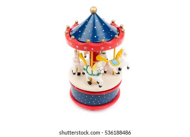 Musical Carousel With Horses. Blue, Red,white Merry Go Round. Toy. Vintage Carousel, Made From Solid Wood. Winter, Christmas, New Year Decoration Isolated On White Background. Closeup. Front, Top View