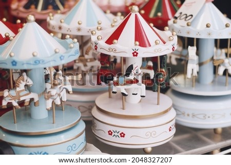 Musical toy carousel with horses.