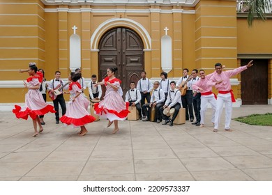 Musician Artists Dance And Sing To The Rhythm Of Guitars And Cajon In A Park. Group Africa 70 - Afro Music Of Peru. September 18, 2016, Lima, Peru