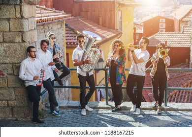 Musician Band Playing Together Outdoor On European  City Street