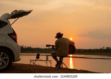 Musician, His Vacation, A New Normal Way Of Life Picnic And Car In During Sunset