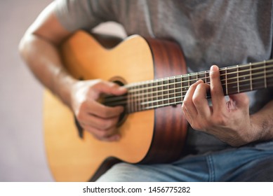 Musician Man Playing Acoustic Guitar