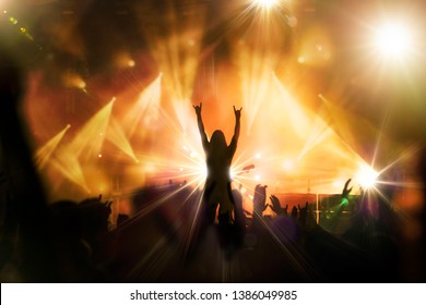 Musician on stage concert with light in background - Shutterstock ID 1386049985