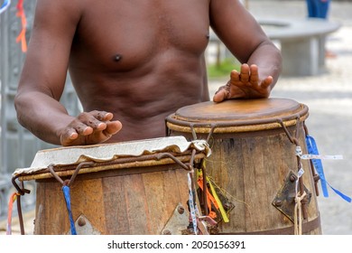 Musician playing atabaque which is a percussion instrument of African origin used in samba, capoeira, umbanda, candomble and various cultural, artistic and religious manifestations in Brazil
