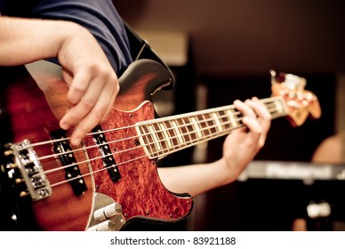 Musician Playing A Bass Guitar