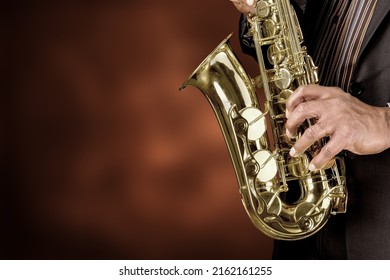 Musician playing jazz music instrument. Band instruments - Shutterstock ID 2162161255