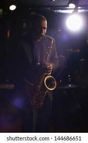 Musician Playing Saxophone In The Jazz Club