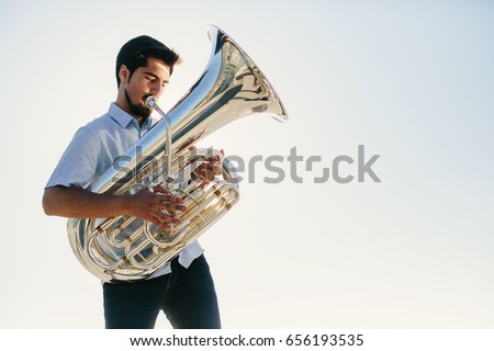musician playing tuba 
