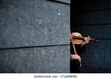 Musician playing violin on the street