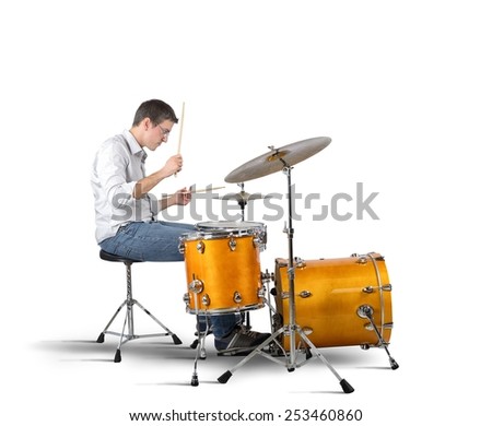 A musician plays his drums with passion