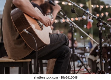 The musician plays and the lead singer sings on stage at the music festival.Concert,mini concert and music festivals.