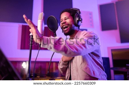 Musician, singing or black man on neon microphone, music studio equipment or practice in theatre recording. Singer, rapper or artist on production, voice media or sound performance in light theater