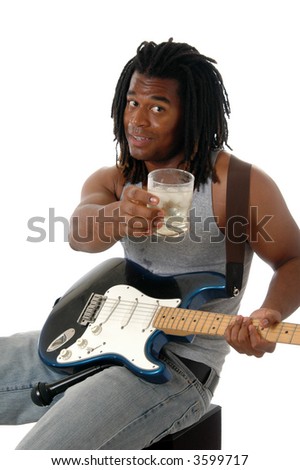 A musician toasting the audience with a drink